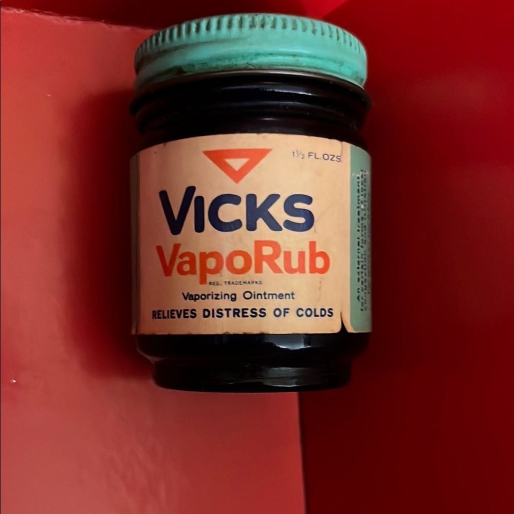 Vicks glass bottle with label